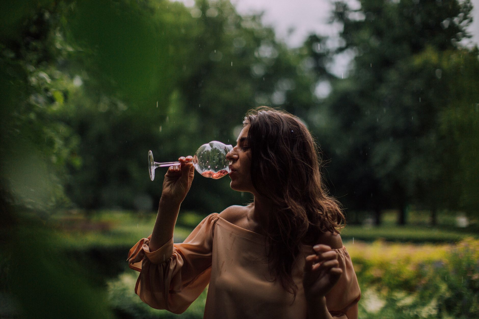 a woman drinking wine